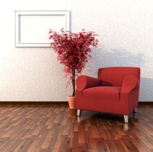 Aardvark Dustless Floor Sanding Services in Norwich and Norfolk > image of polished wooden floor with red chair and plant